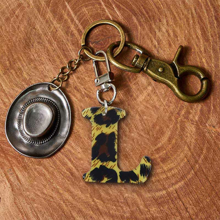 Schlüsselanhänger mit Buchstaben- und Cowboyhut-Anhänger im Leopardenmuster - Messing-Schlüsselanhänger + Silberhut - L - image 19