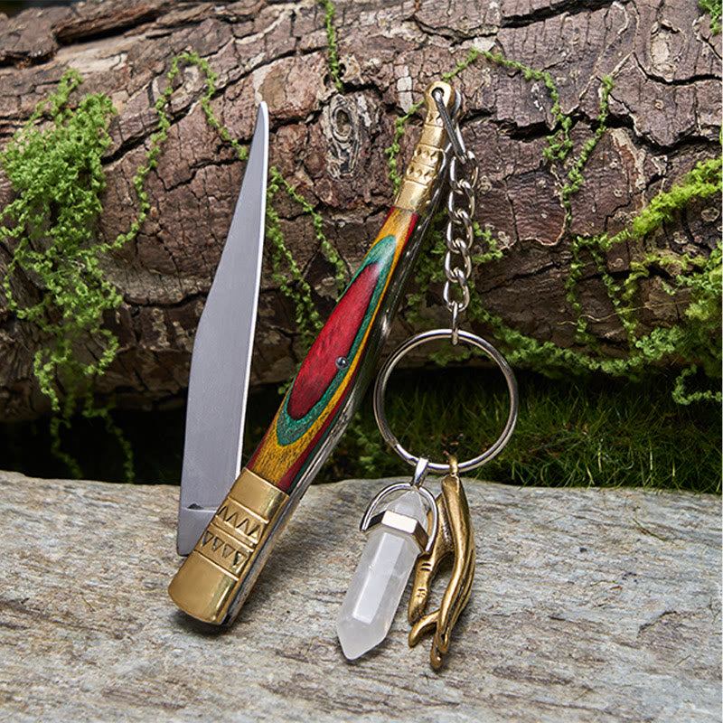 Outdoor-Klappmesser mit farbenfrohem Griff und weißer Buddha-Hand-Halskette aus Kristall - image 1