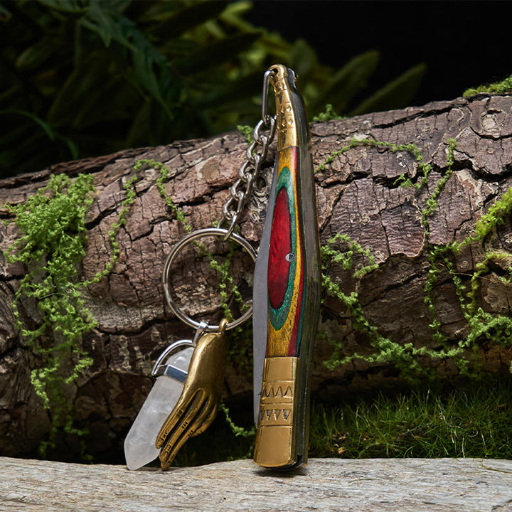 Outdoor-Klappmesser mit farbenfrohem Griff und weißer Buddha-Hand-Halskette aus Kristall - Halskette mit Klappmesser - image 0