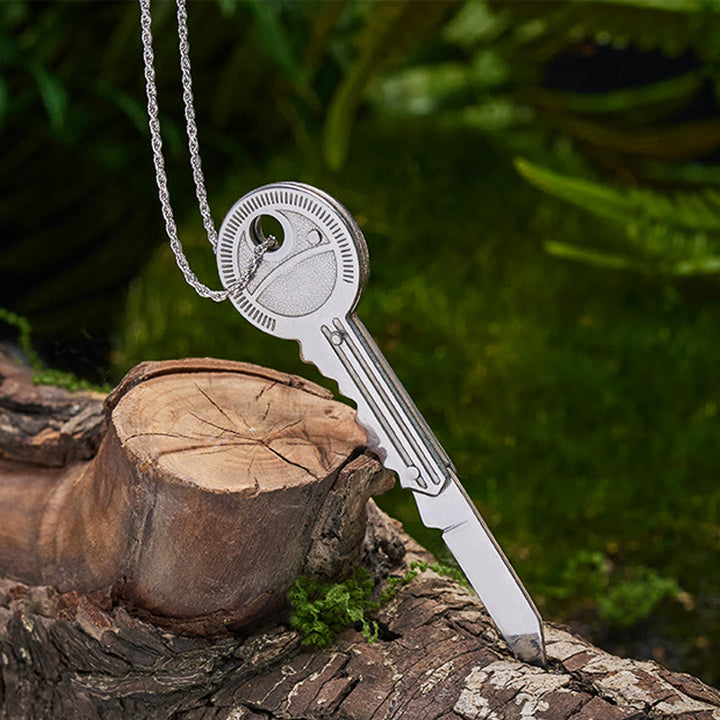 Praktischer Klappmesser-Schlüsselanhänger, silberne Halskette - image 1