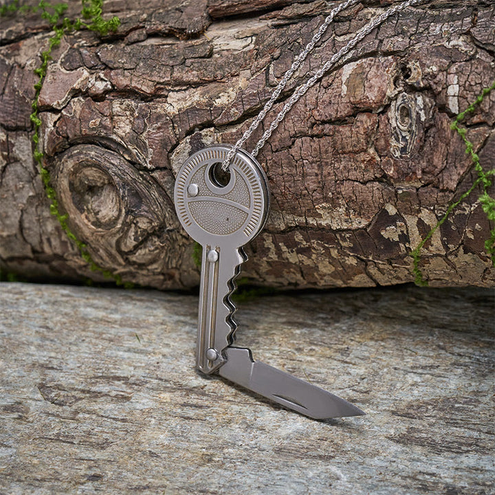 Praktischer Klappmesser-Schlüsselanhänger, silberne Halskette - image 2