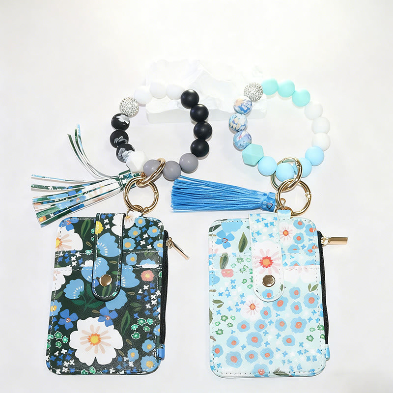 Armband und Geldbörse im farbenfrohen und natürlichen Stil mit Blumenmuster. - image 0