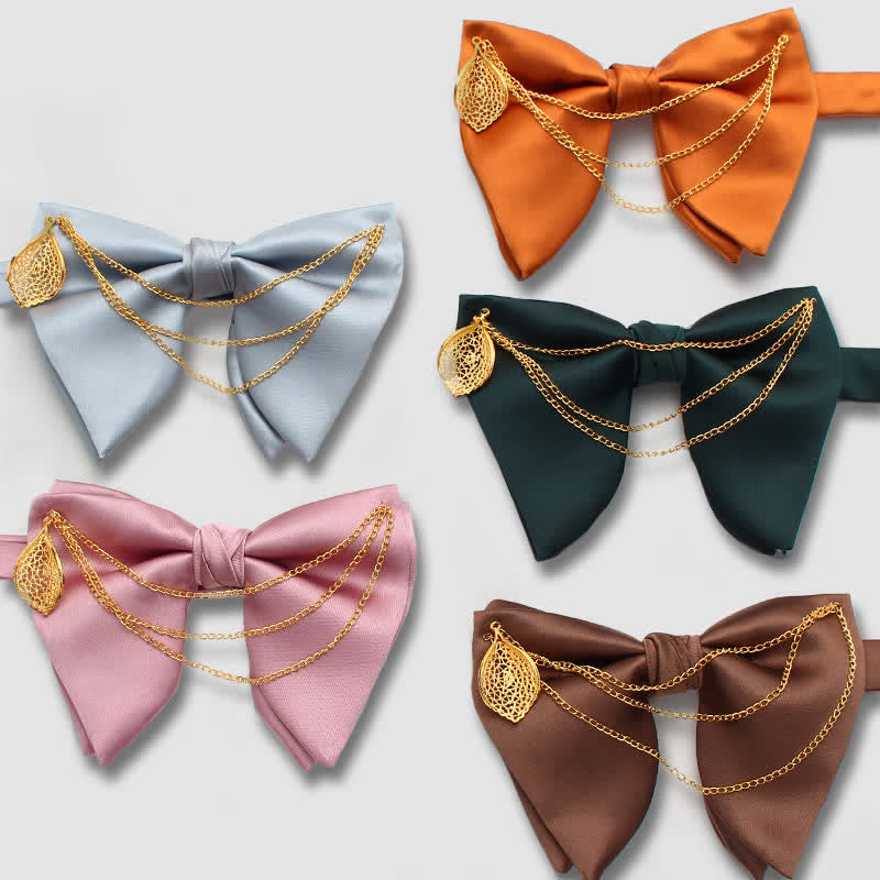 Übergroße, spitz zulaufende Fliege mit Goldblattdekor und Kette - image 0