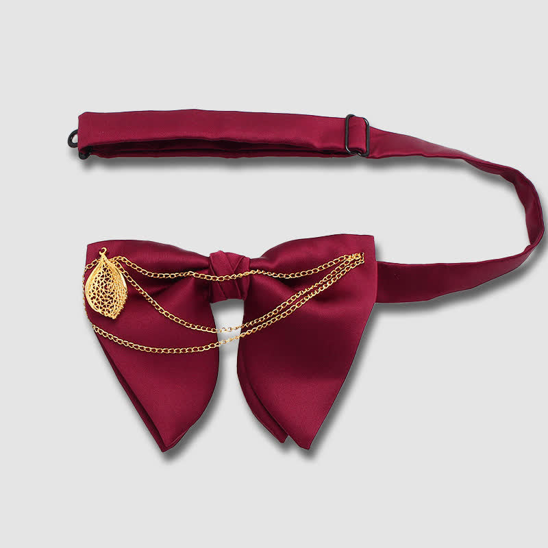 Übergroße, spitz zulaufende Fliege mit Goldblattdekor und Kette - image 2