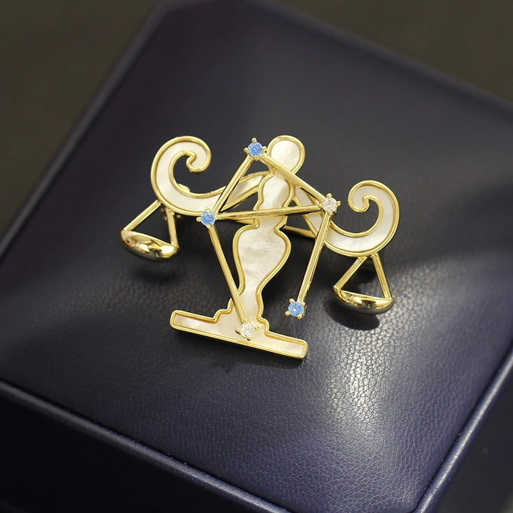 Brosche mit 12 Sternbildern aus Perlmutt und blauem Kristall in Gold - image 13