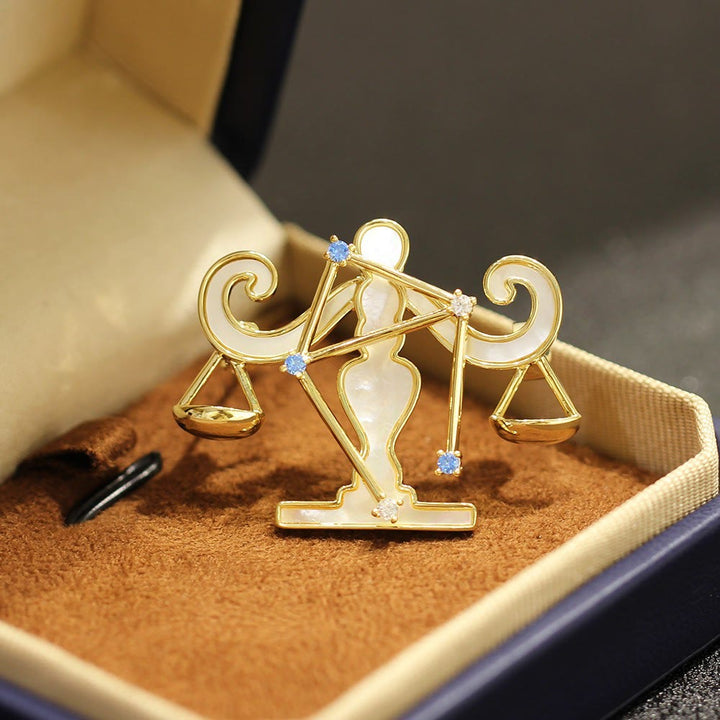 Brosche mit 12 Sternbildern aus Perlmutt und blauem Kristall in Gold - Waage - image 12