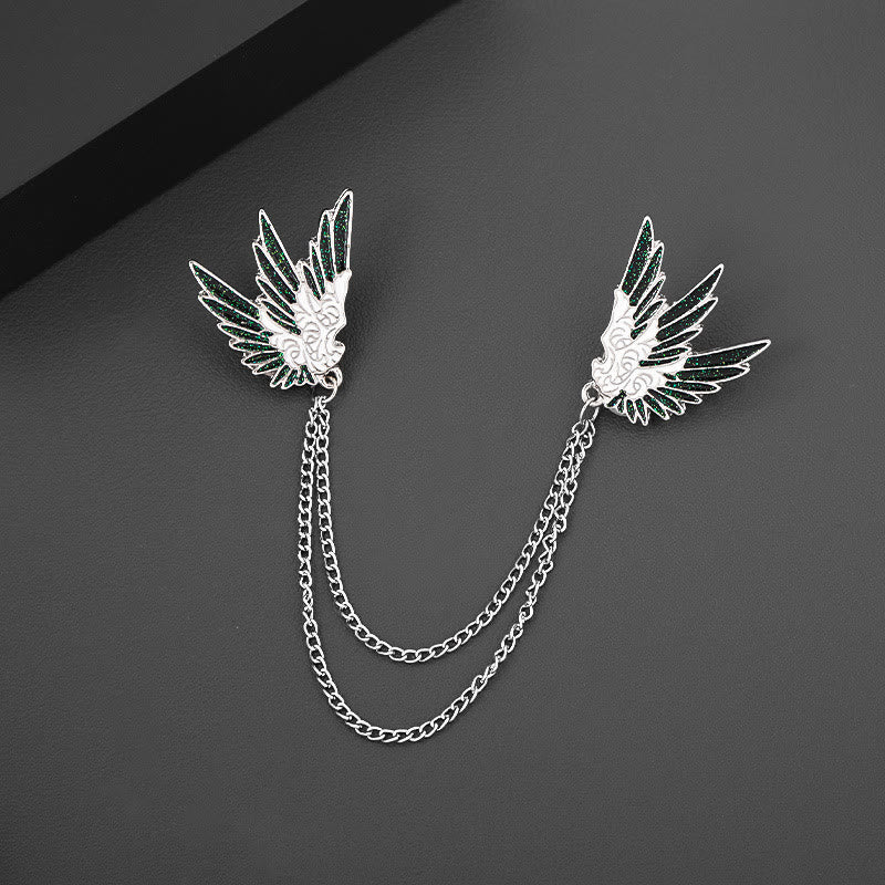 Verzierte, symmetrische Doppelkettenbrosche mit Flügelpaar. - image 3