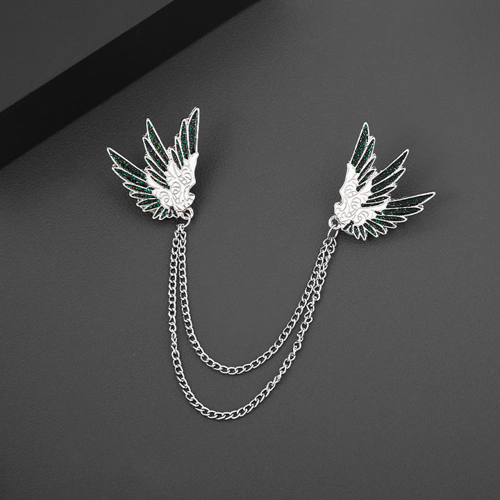 Verzierte, symmetrische Doppelkettenbrosche mit Flügelpaar. - image 3