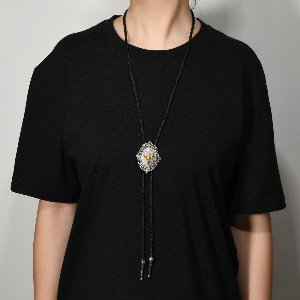 Vintage Bolo-Krawatte mit Pferde- und Stierkopfemblem aus geschnitztem Metall - image 3