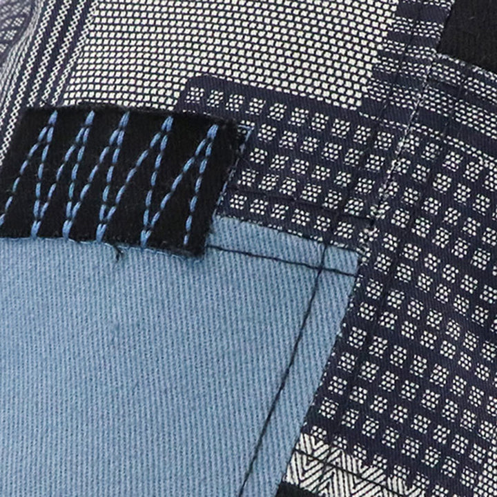 Handgefertigte Patchwork-Schiebermütze mit Zickzackstich und verschiedenen Texturen - image 3