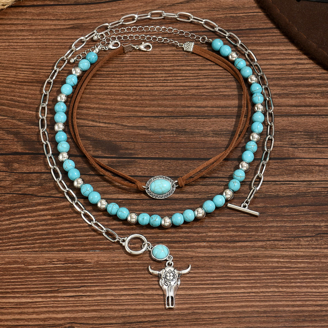 Halskette im Western-Stil mit türkisfarbener Perle und silbernem Kuhschädelanhänger - Blau - image 0