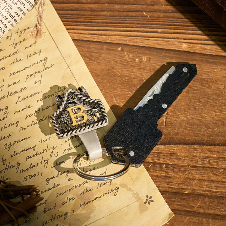 Schlüsselanhänger im Western-Retro-Stil mit Buchstaben und schlüsselförmigem Messer - image 1