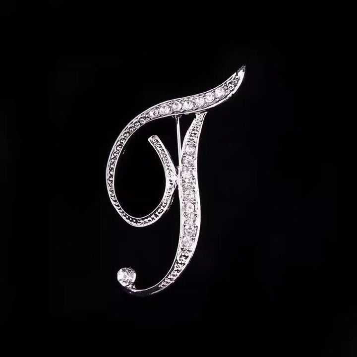 Brosche mit Diamantenbesatz an Initialen aus Gold und Silber - Silber - T - image 41