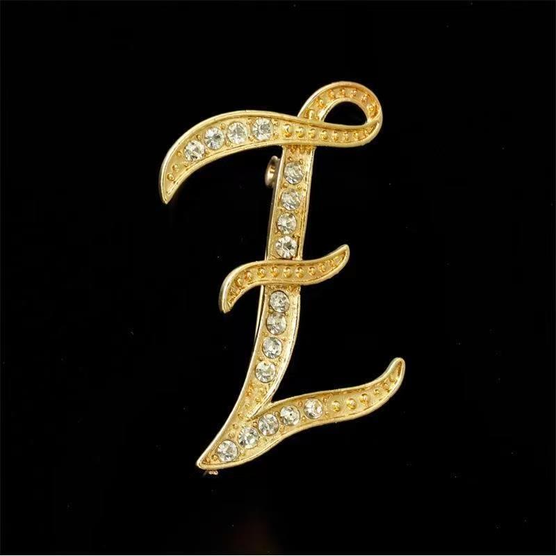 Brosche mit Diamantenbesatz an Initialen aus Gold und Silber - Golden - Z - image 23