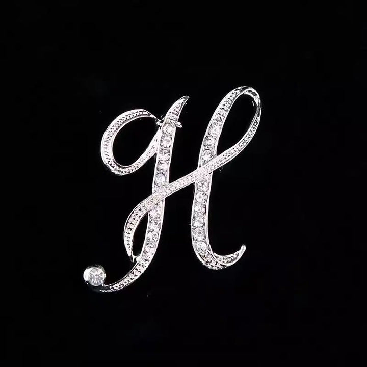 Brosche mit Diamantenbesatz an Initialen aus Gold und Silber - Silber - H - image 30