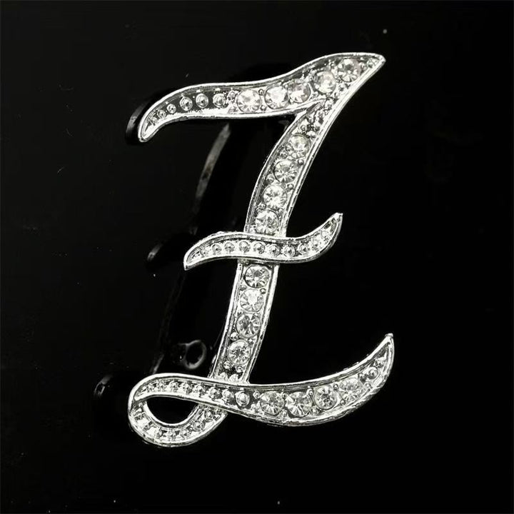 Brosche mit Diamantenbesatz an Initialen aus Gold und Silber - Silber - Z - image 47