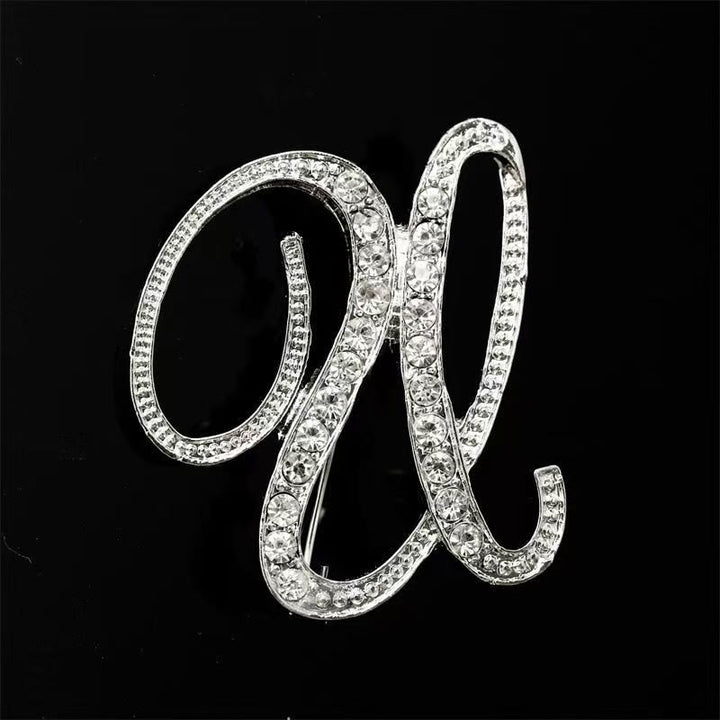 Brosche mit Diamantenbesatz an Initialen aus Gold und Silber - Silber - U - image 42