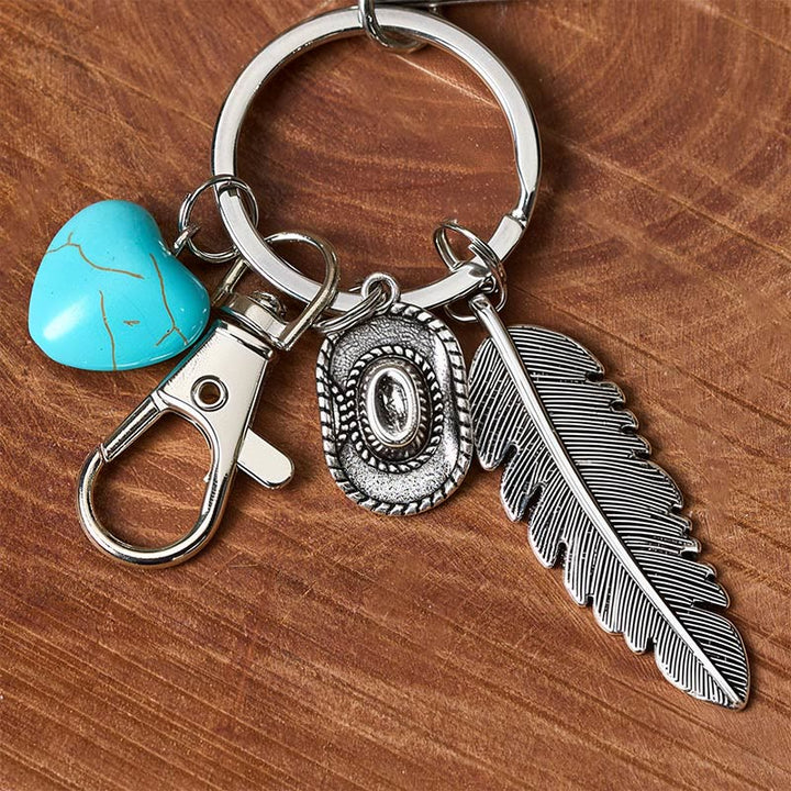Western Feather Türkis Anhänger, silbernes Klappmesser, Schlüsselanhänger - image 3