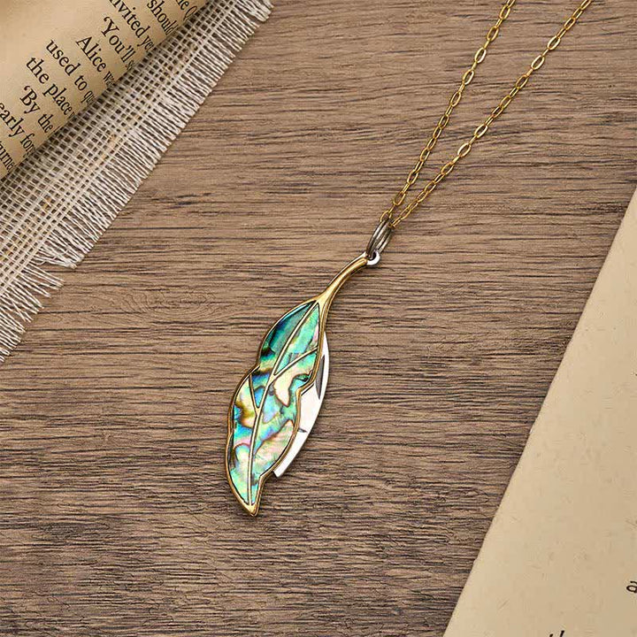 Halskette mit blattförmigem, funktionalem Taschenmesser aus Abalone - image 4