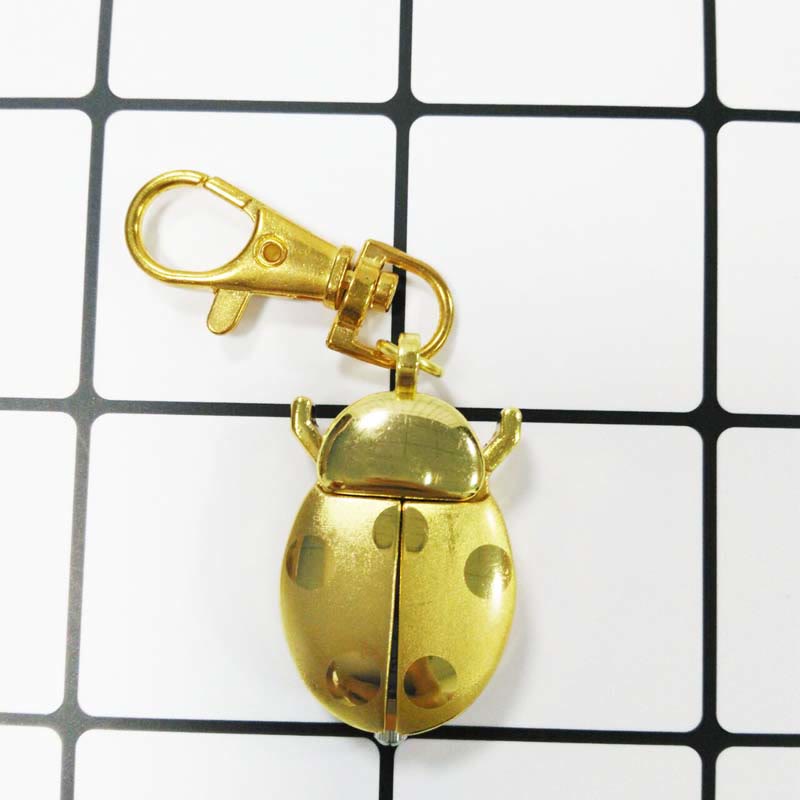 Antike Taschenuhr mit klappbaren Flügeln in Form eines Skarabäus - Goldener Schlüsselanhänger - image 8