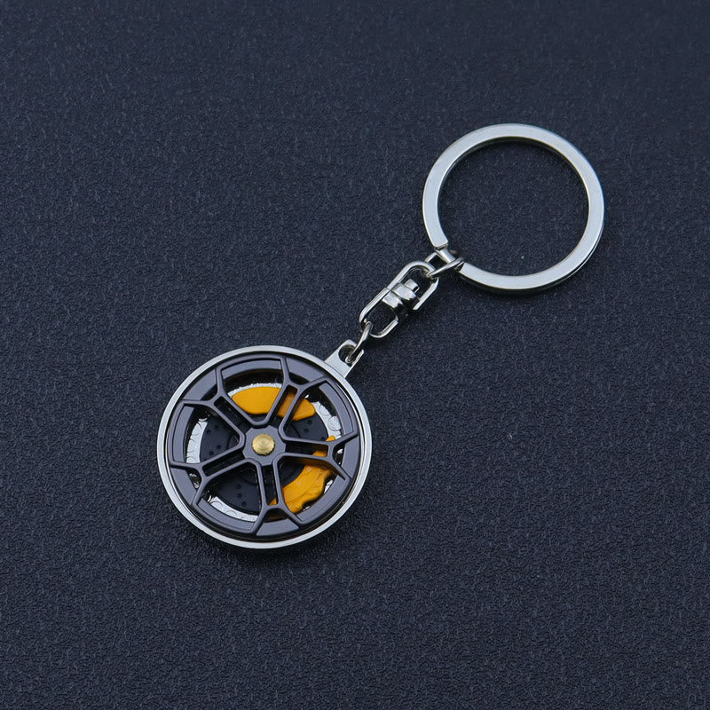Mini-Schlüsselanhänger-Kollektion im modernen Autoteile-Design - Doppelsattel-Naben-Drehteller - image 2
