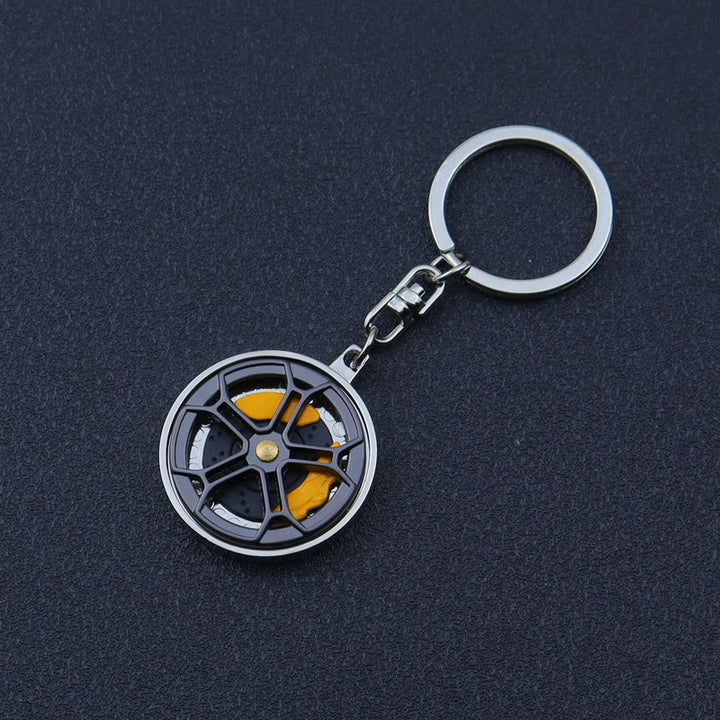 Mini-Schlüsselanhänger-Kollektion im modernen Autoteile-Design - Doppelsattel-Naben-Drehteller - image 2