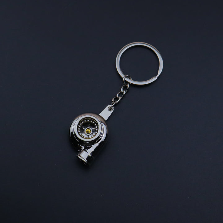 Mini-Schlüsselanhänger-Kollektion im modernen Autoteile-Design - Silberne Turbine - image 11