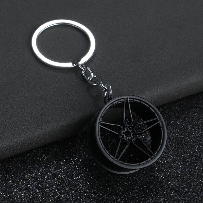 Mini-Schlüsselanhänger-Kollektion im modernen Autoteile-Design - Schwarzes Großes Rad - image 10