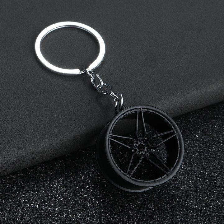 Mini-Schlüsselanhänger-Kollektion im modernen Autoteile-Design - Schwarzes Großes Rad - image 10