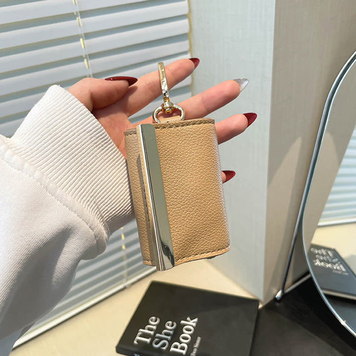 Faltbare Nylon-Schultertasche mit Schlüsselanhänger und Lederakzenten - image 13