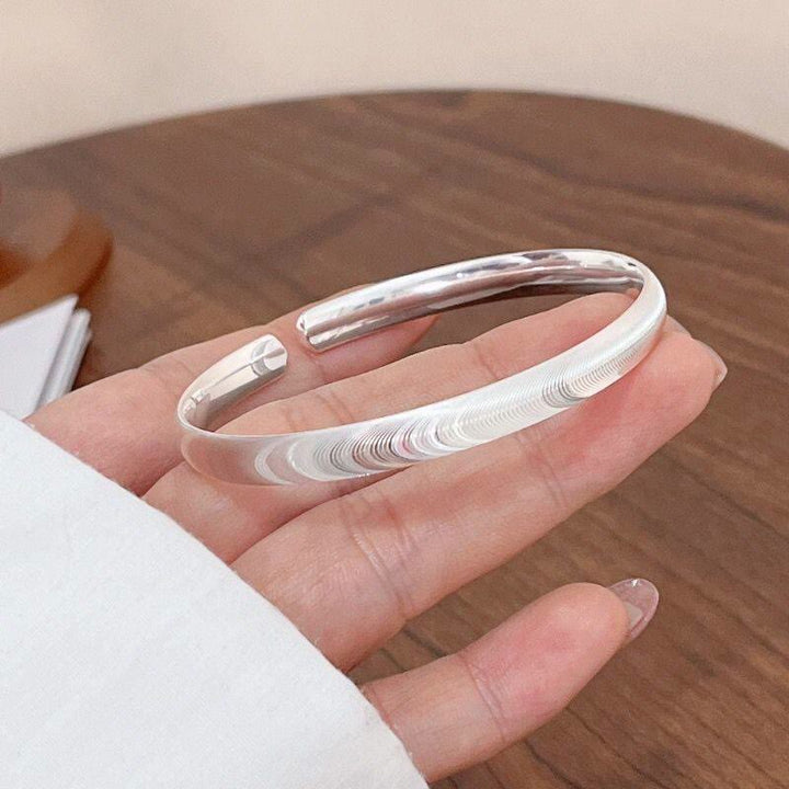 Minimalistisches, wellenförmiges, offenes Armband aus Silber - image 5