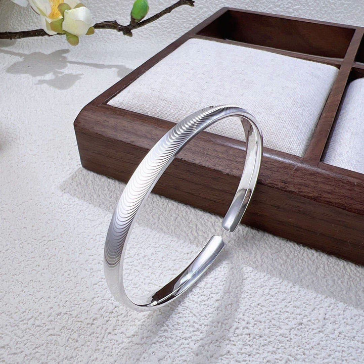 Minimalistisches, wellenförmiges, offenes Armband aus Silber - image 7