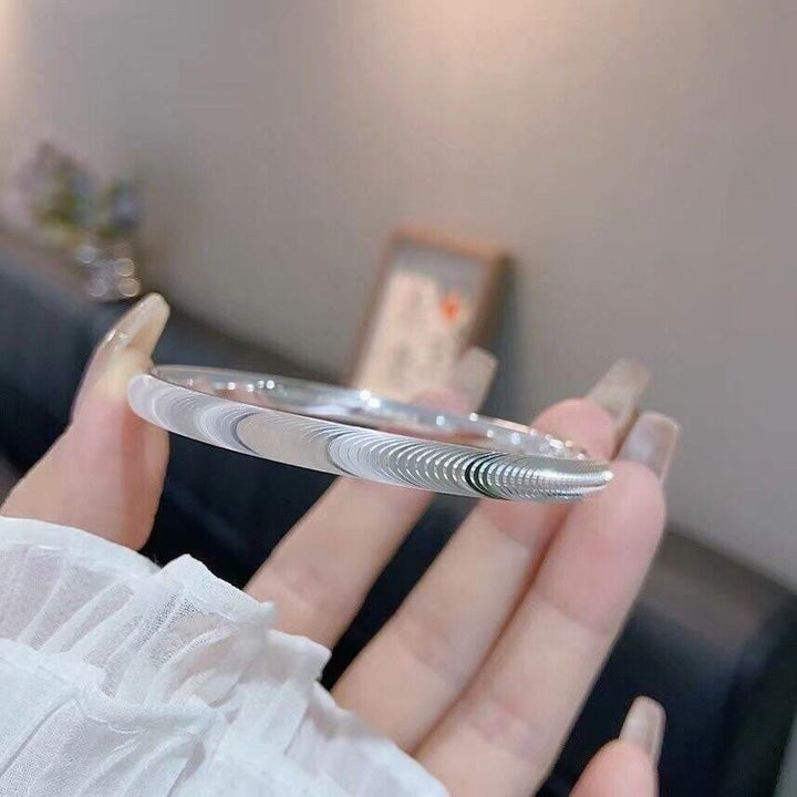 Minimalistisches, wellenförmiges, offenes Armband aus Silber - image 4