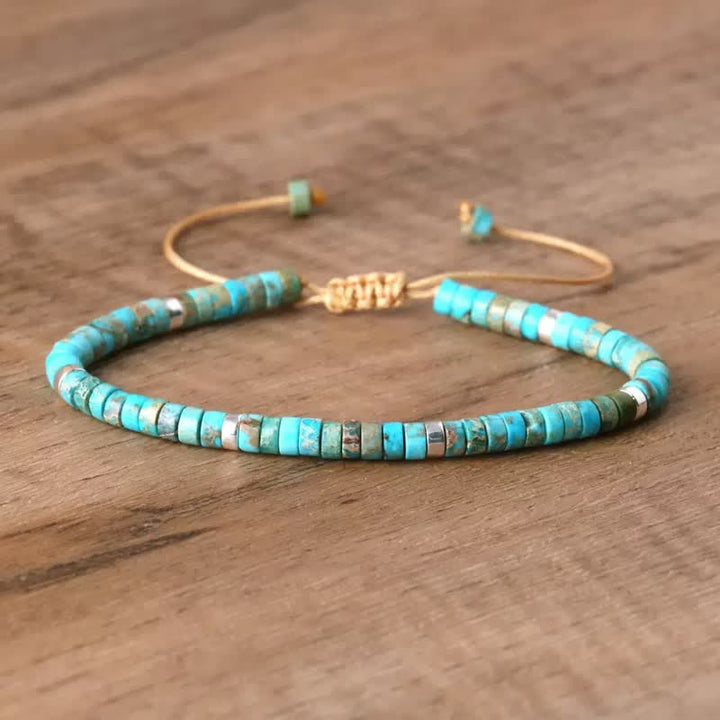 Türkisfarbenes Scheibenperlenarmband mit verstellbarer Kordel - Türkis - image 0