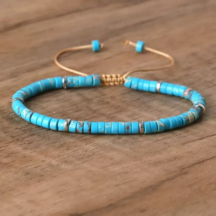 Türkisfarbenes Scheibenperlenarmband mit verstellbarer Kordel - Blau - image 1