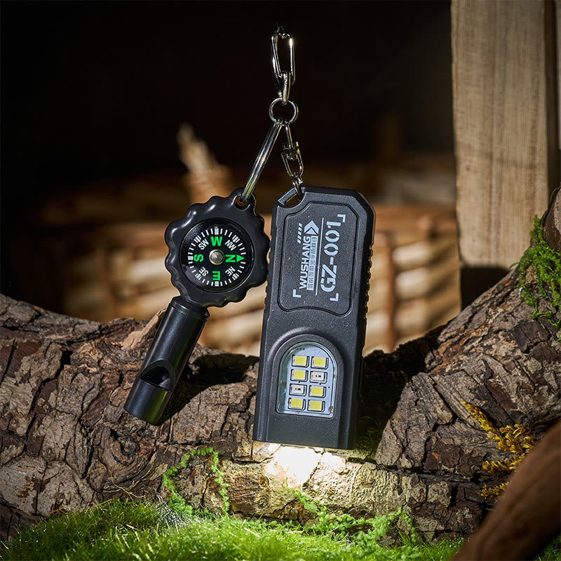 Mini-Taschenlampe mit Cob-Lampe, Überlebenspfeife und Kompass-Schlüsselanhänger - Stil Nr. 1 - image 0