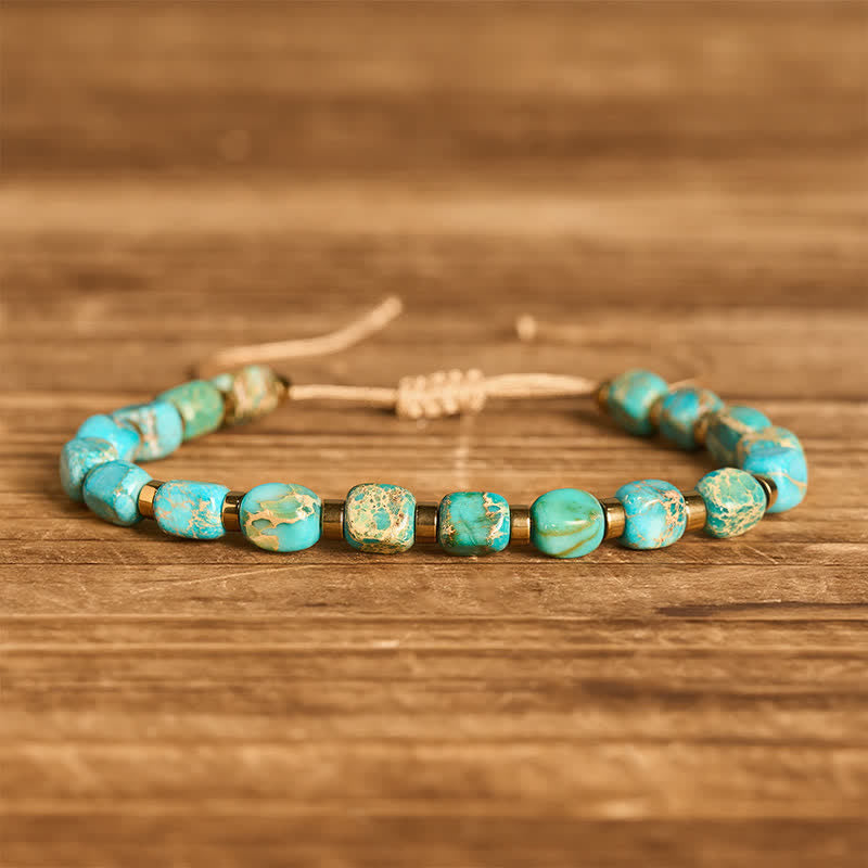 Boho-Armband mit türkisfarbenen Perlen und verstellbarem geflochtenem Band - Türkis - image 0