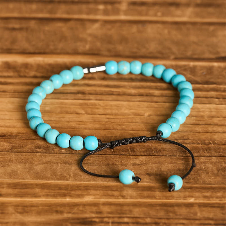 Armband mit türkisfarbenen Perlen und verstellbarem Anhänger mit Glaubenskreuz - image 6