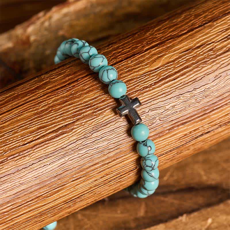 Armband mit türkisfarbenen Perlen und verstellbarem Anhänger mit Glaubenskreuz - image 1