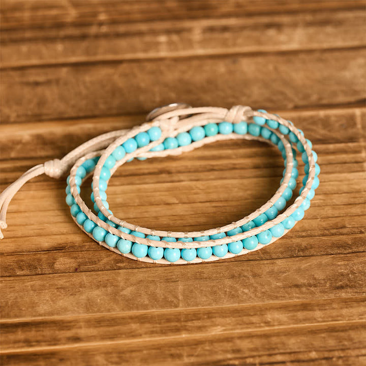 Elegantes, doppelt gewickeltes türkisfarbenes Perlenarmband mit beiger Kordel - image 3