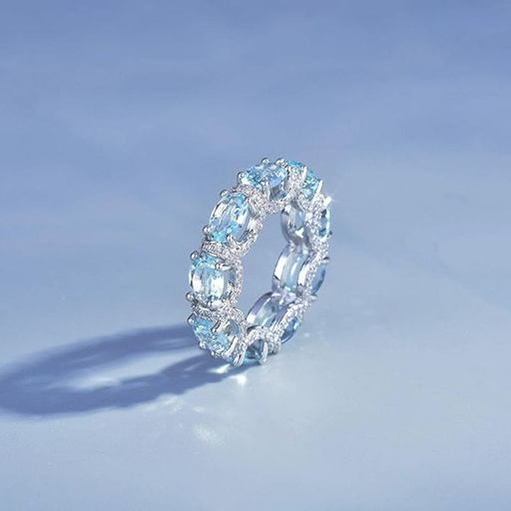 Hellblauer Kristall-Ewigkeitsring mit Pavé-Zirkonia, Stapelring für Damen - US 10 - image 0