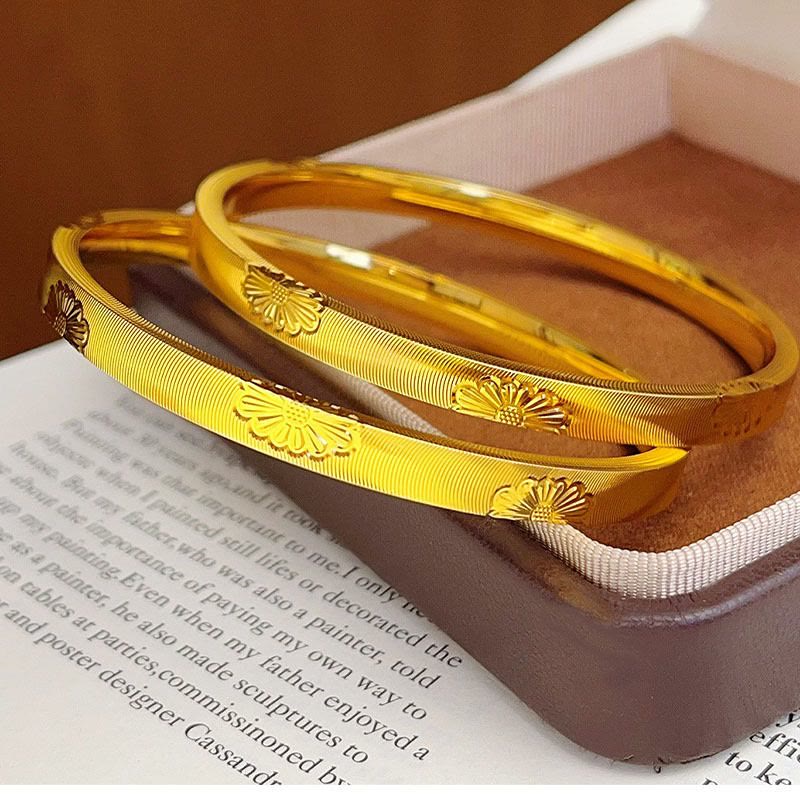 Goldfarbenes, gänseblümchenförmiges Armband mit Katzenaugen-Textur, geschlossenes Armband für Damen - Kleines Daisuke Katzenaugen-Armband (62 mm) - image 1