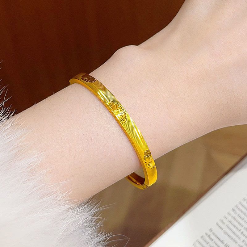 Goldfarbenes, gänseblümchenförmiges Armband mit Katzenaugen-Textur, geschlossenes Armband für Damen - image 2