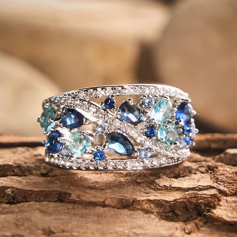 Breiter Damenring mit mehreren Zirkonia-Steinen im Pavé-Stil - Ozeanblau - US 10 - image 0