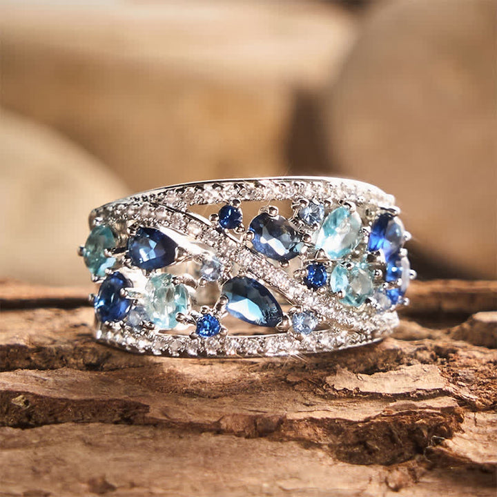 Breiter Damenring mit mehreren Zirkonia-Steinen im Pavé-Stil - Ozeanblau - US 10 - image 0
