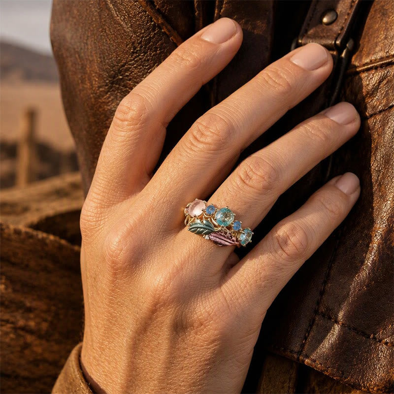 Statement-Ring für Damen mit Emaillefeder und Kristallintarsien - image 1
