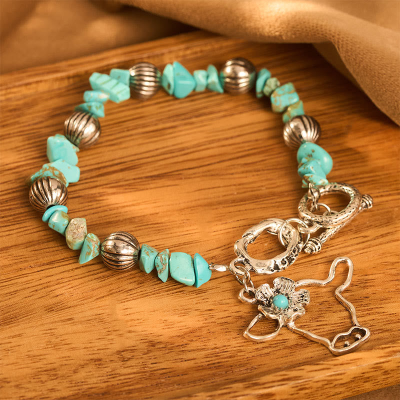Vintage Western Armband mit Türkis-Chips, antikem Silber, Stierschädel und Blumenmuster - image 3