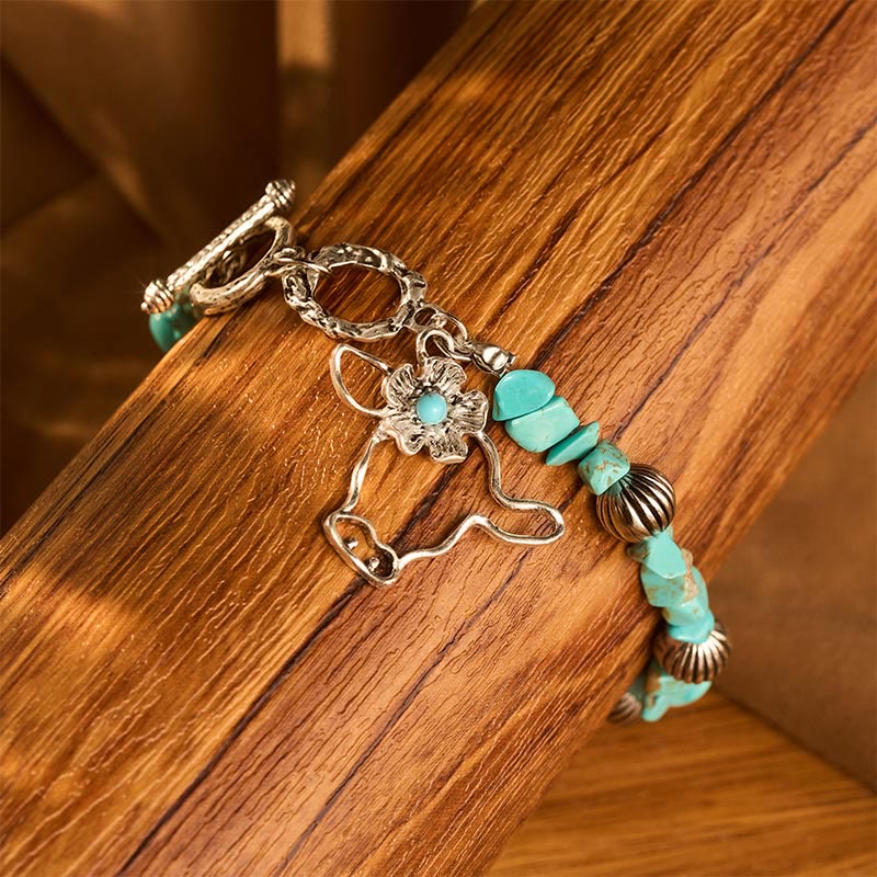 Vintage Western Armband mit Türkis-Chips, antikem Silber, Stierschädel und Blumenmuster - image 2