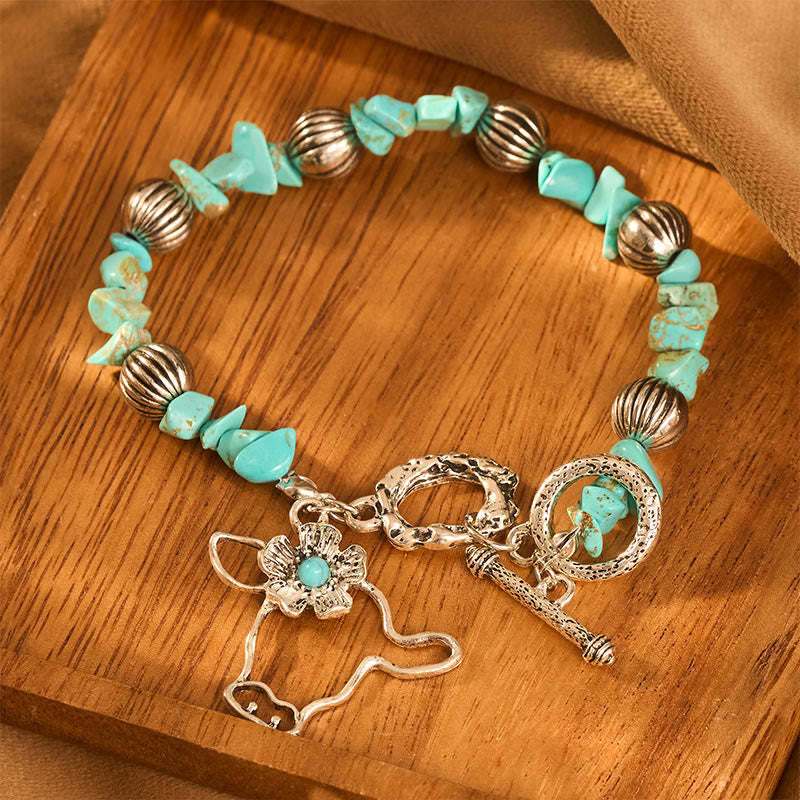 Vintage Western Armband mit Türkis-Chips, antikem Silber, Stierschädel und Blumenmuster - image 4