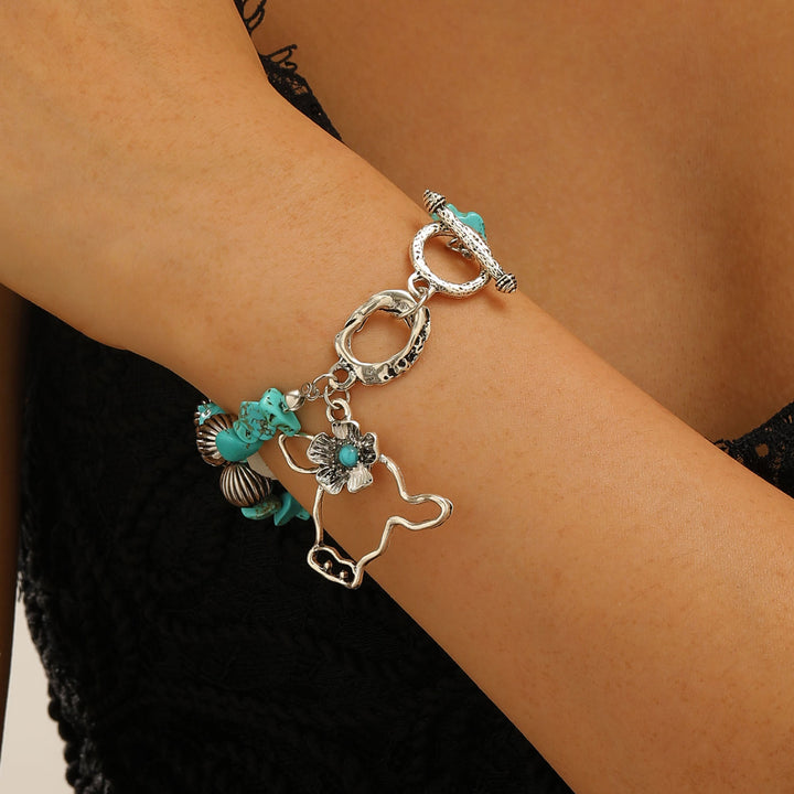 Vintage Western Armband mit Türkis-Chips, antikem Silber, Stierschädel und Blumenmuster - Grün - image 1